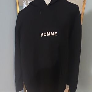 Comme des Garcons Black Hoodie with White Logo Tag